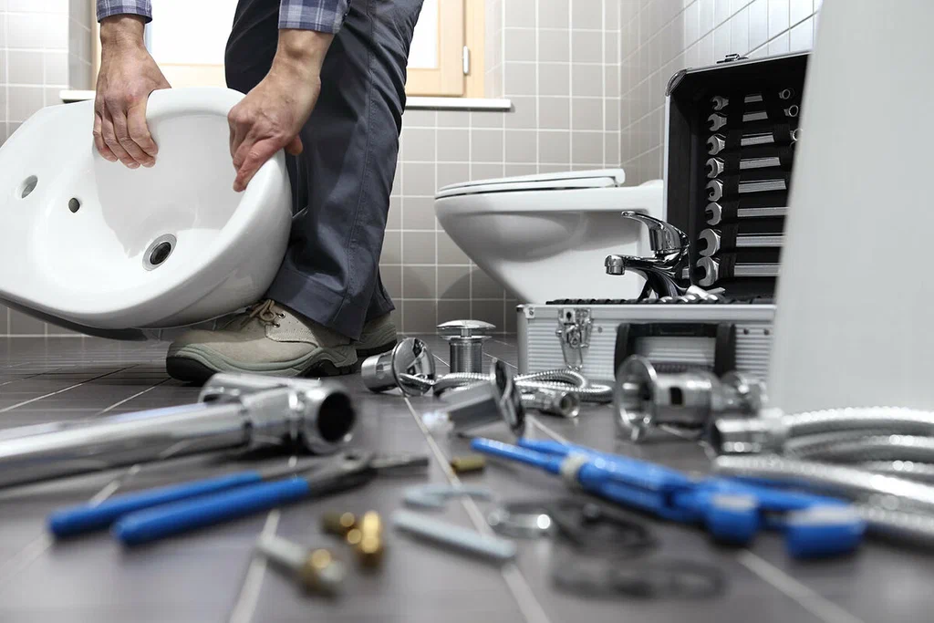 Plumbing tools prepared for a bathroom repair in Highland