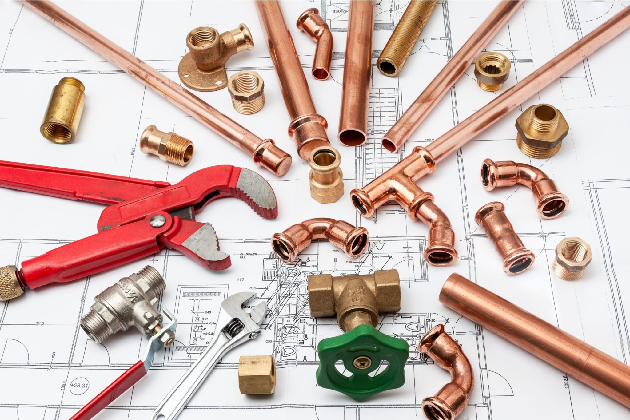 Copper pipes, fittings, valves, and plumbing tools in Highland